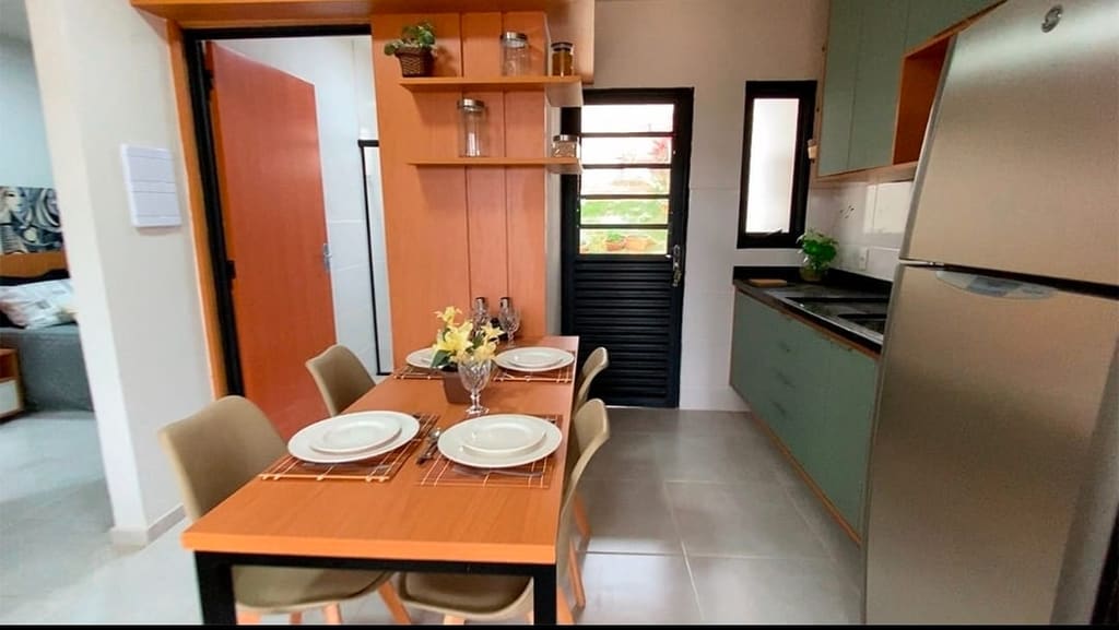 Sala de jantar integrada à cozinha